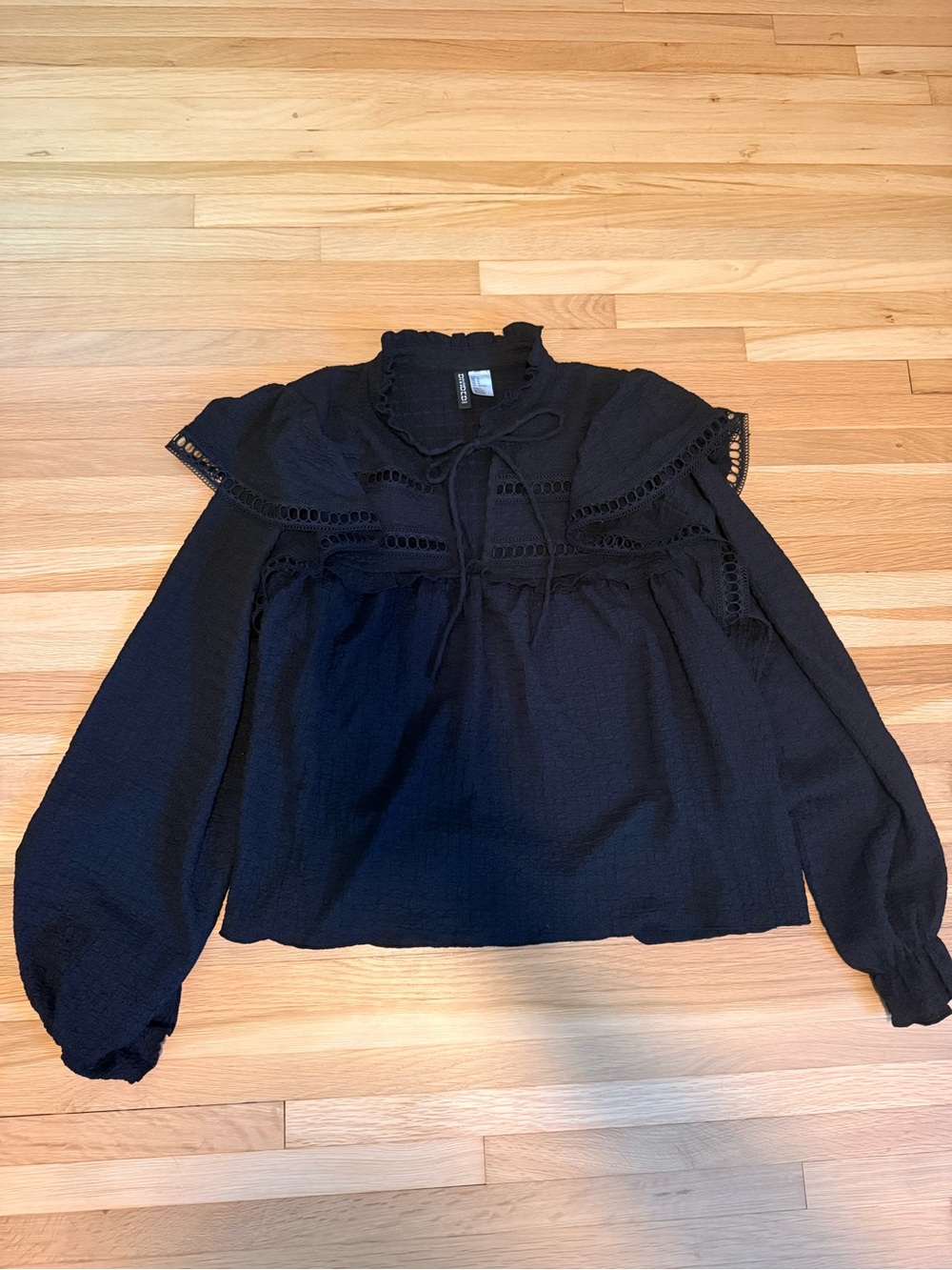 Divided Black Ruffle-Yoke Tie Neck Blouse